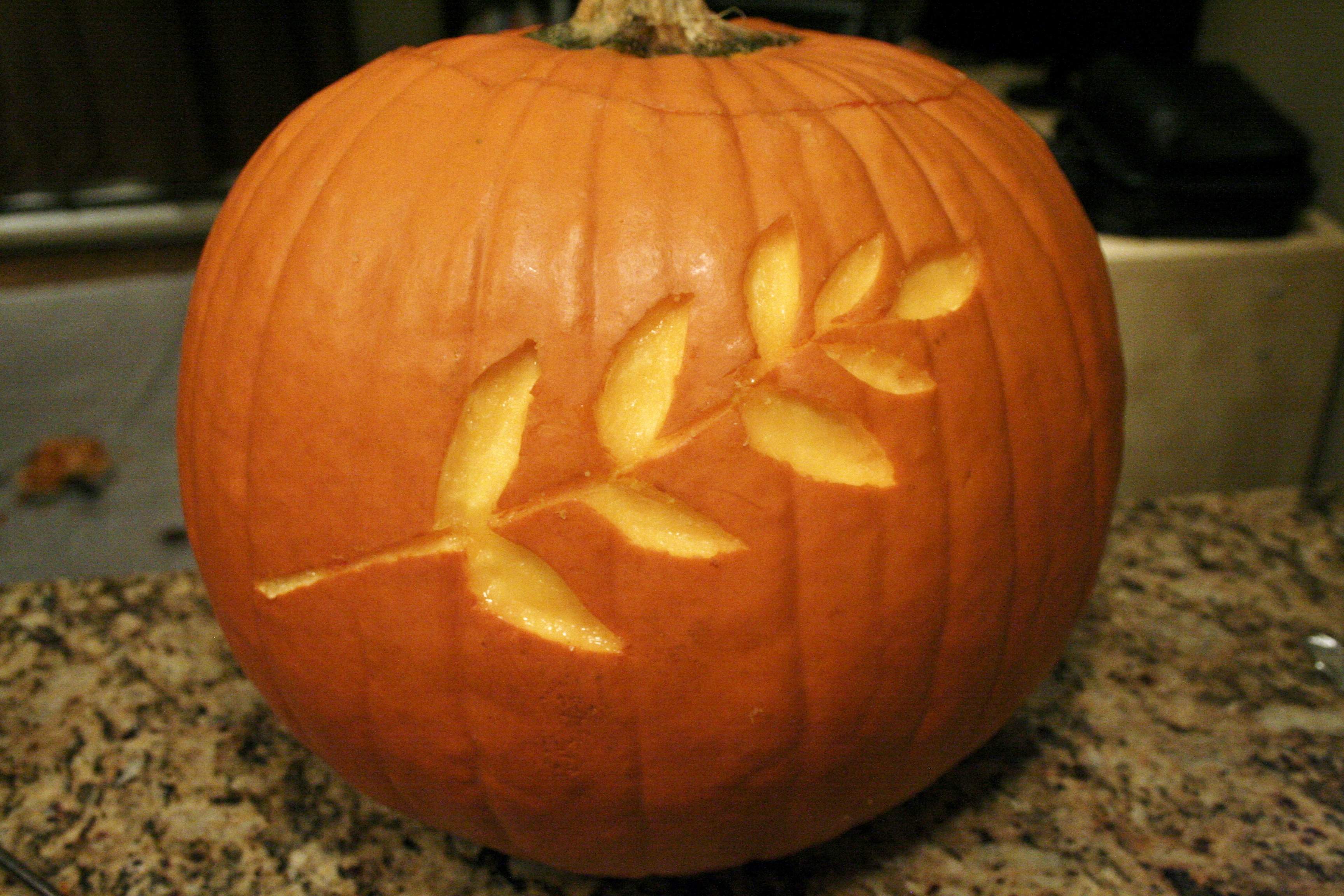 Carved pumpkin (roast the seeds with curry for a healthy snack!)